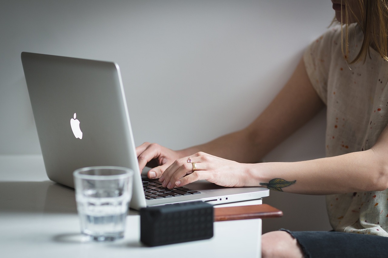 Laptop, apple, macbook — Burlington's Guide to Eco-Friendly Window Cleaning Solutions