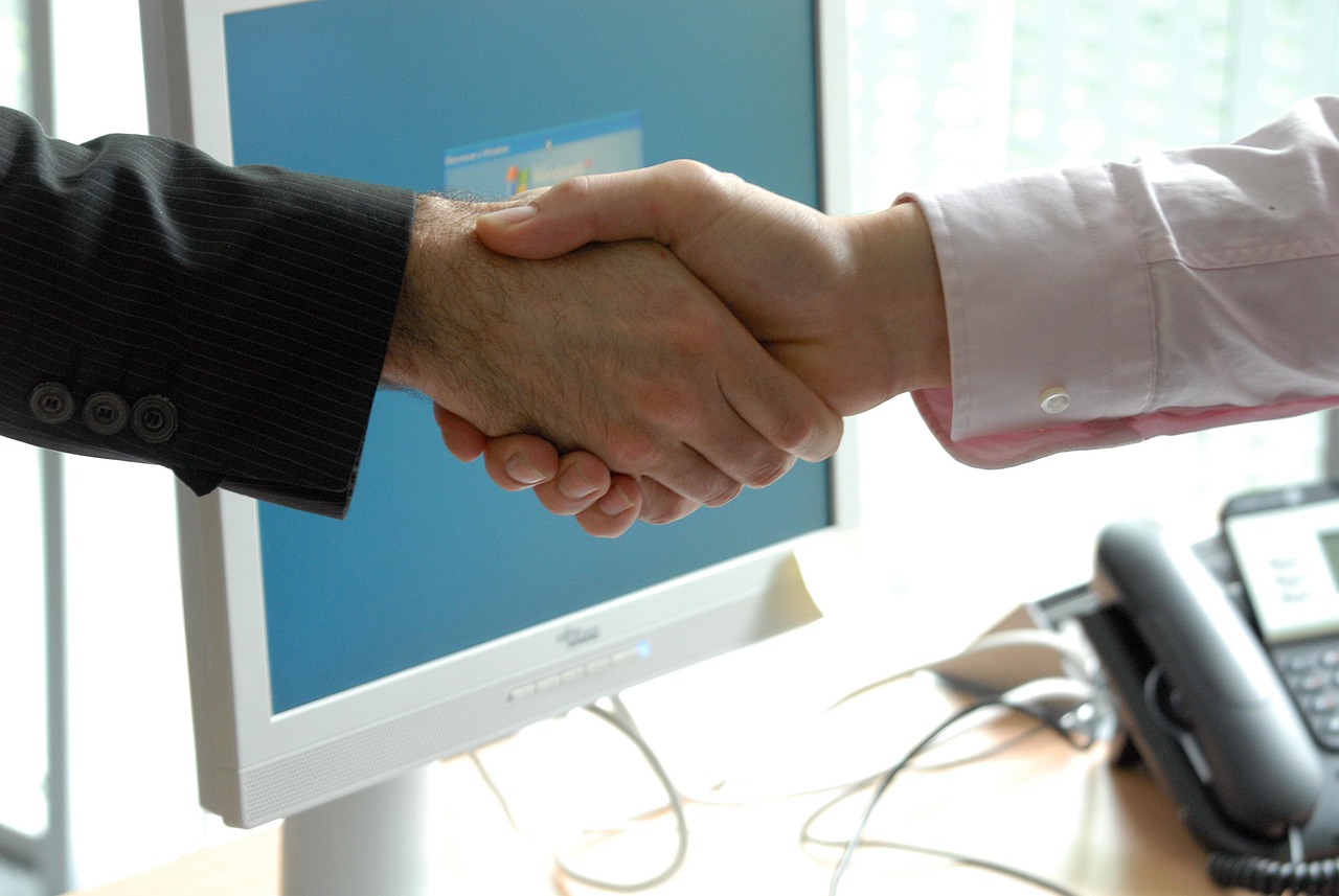 Hand shake, business, professional — Maximize Your Output with the Bambu Lab H2C Printer, Available Now at Convoy-Westcan