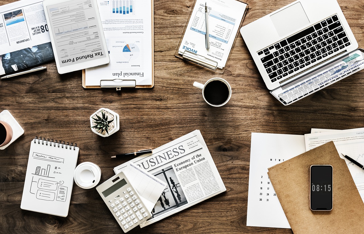 Desk, work, business — Navigating the University Hill Property Market: Expert Advice and Trends